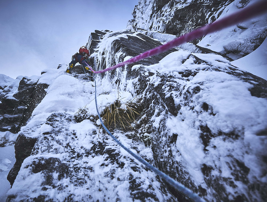 A climber on the route Twisting Grooves on Stob Coire nan Lochan