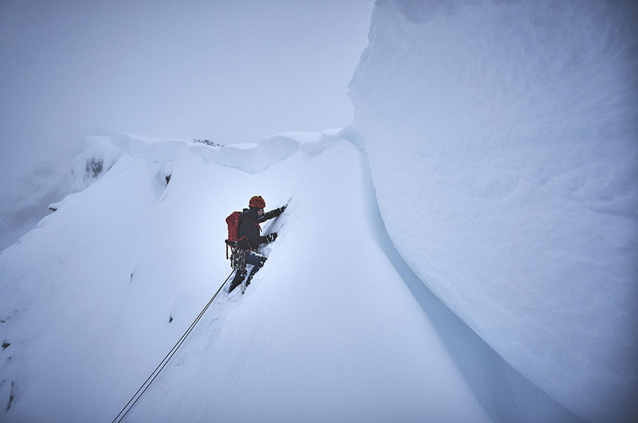 A climber approaches the cornice near the summit of Stob Coire nan Lochan